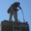Safety harness set-up for commercial chimney repair.